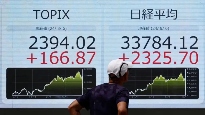 GLOBAL-MARKETS-JAPAN-4_1723167541320_1723167576210-1024x576-1 Tata Share Price Q2 Earnings in Focus